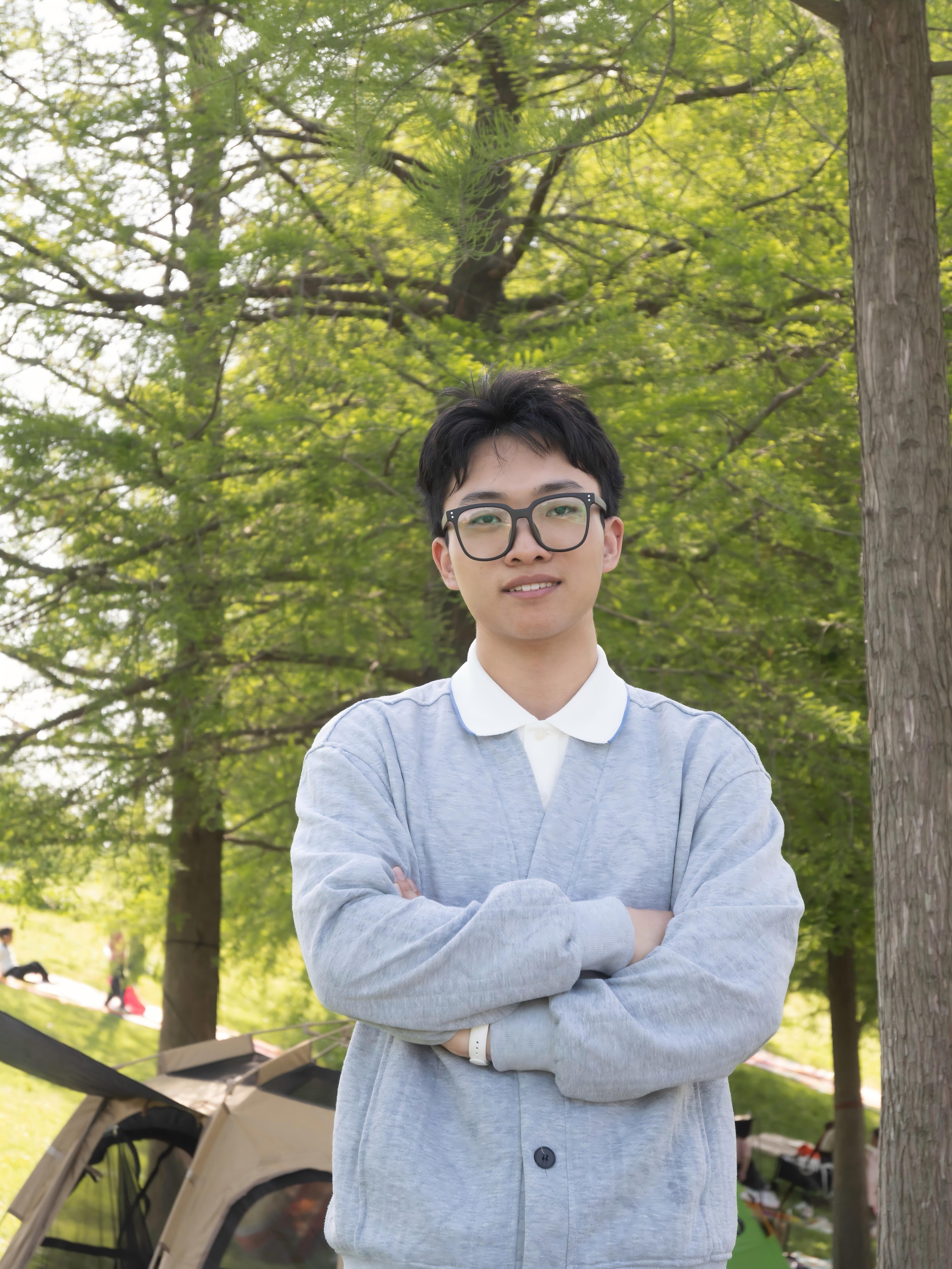 Xiaogang Tang